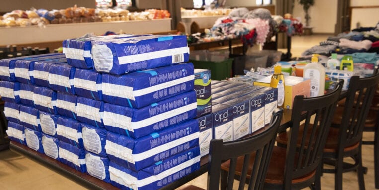 Stacks of donated diapers and pull-ups in the Samaritan Center.