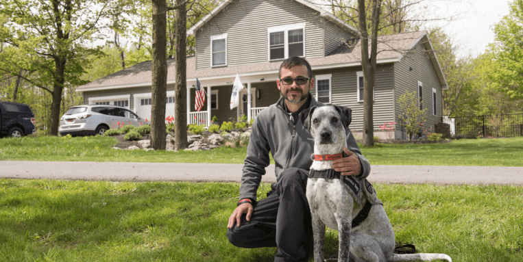 Clear Path for Veterans soldier posing with his dog.