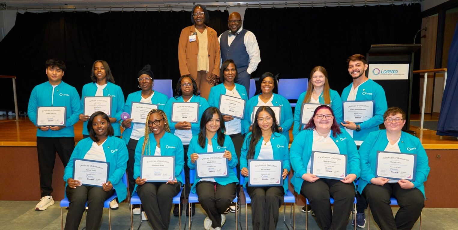Group of people holding awards
