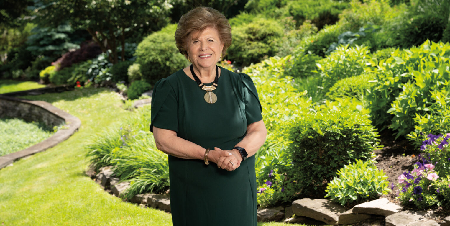 Woman standing outside in garden patio