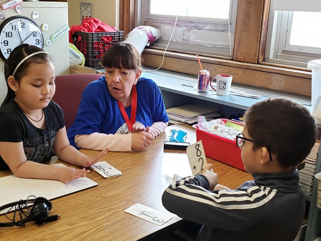 Foster grandparents with children