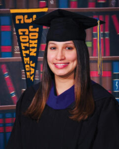 Girl in graduation hat and garb