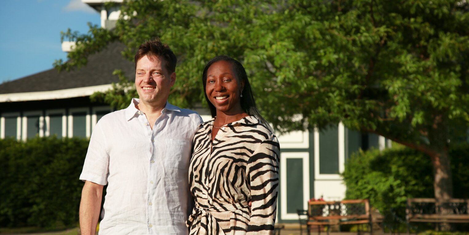 Angel Winfield and Lance Lyons stand in front of the Rev Theatre Company in Auburn