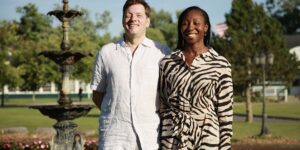 Angela Winfield & Lance Lyons standing outside