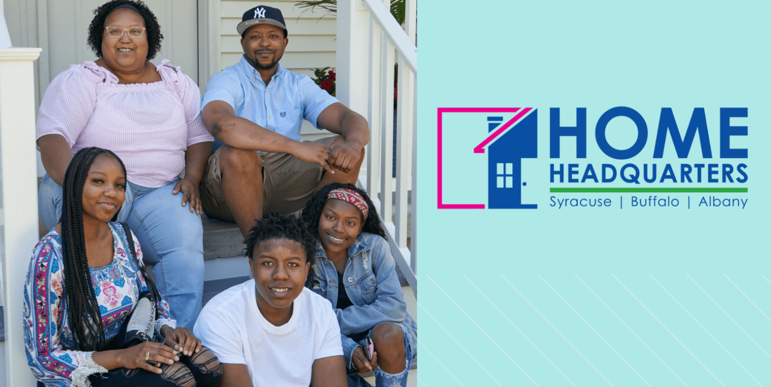 Family sits on porch of new home on Shuart Ave