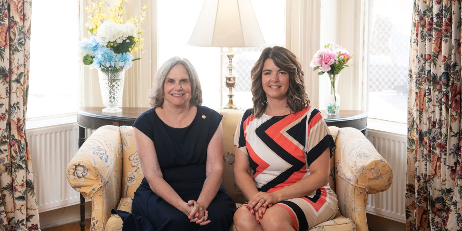 Two women sitting together