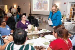 People at tables at an event