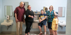 Group of People Standing In Front of Water Fountain