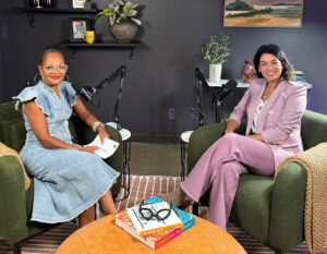 Two women sitting in chairs